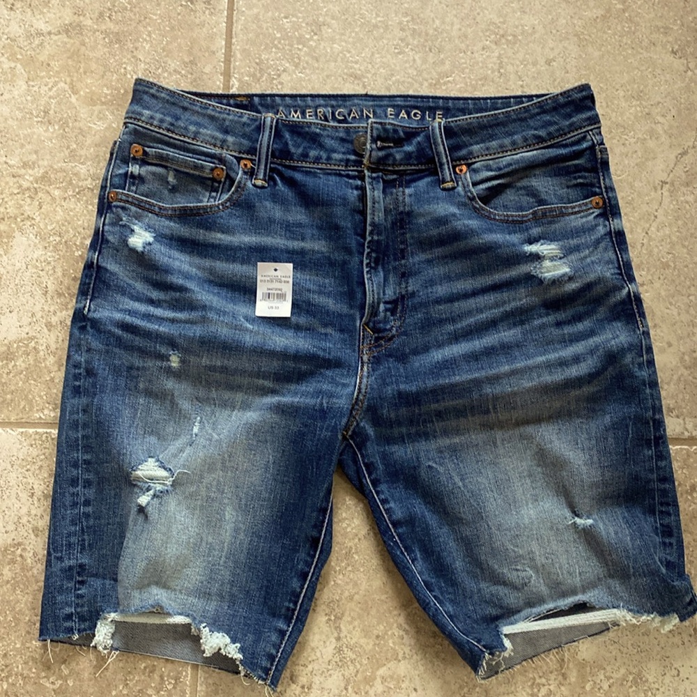 American Eagle distressed denim shorts”jorts” size 33 nwot